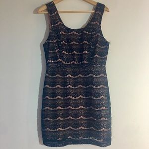 Black lace dress with pink slip